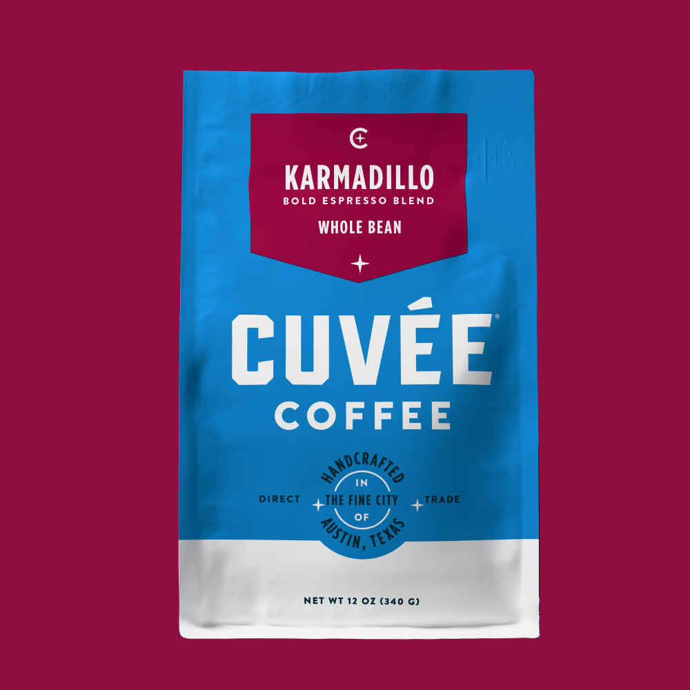 Karmadillo 12oz Coffee Bag on a maroon background